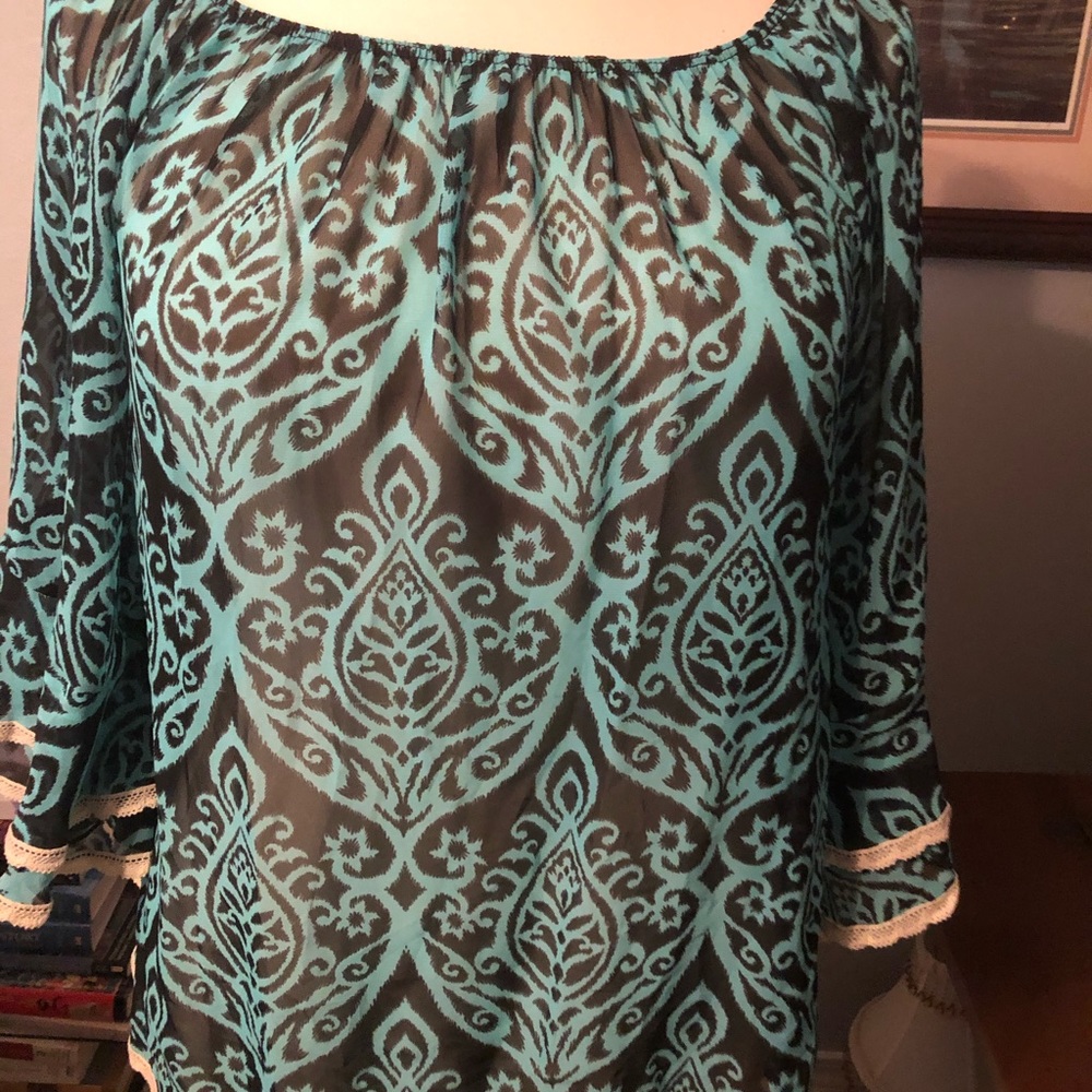Green summer blouse with white trim